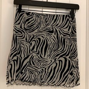 NWOT Urban Outfitters skirt. Super fun print. Mesh material. Smoke free home